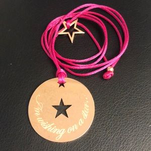 “I’m wishing on a star” with pink cord necklace.